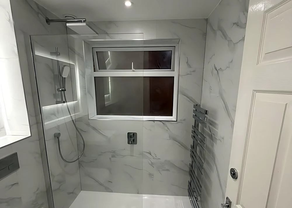 After: Billericay bathroom with a walk-in shower and marble-effect tiles