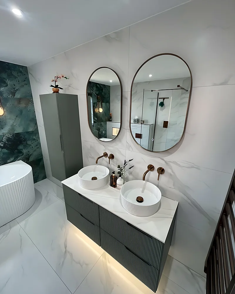 Double vanity with two basins and oval LED mirrors