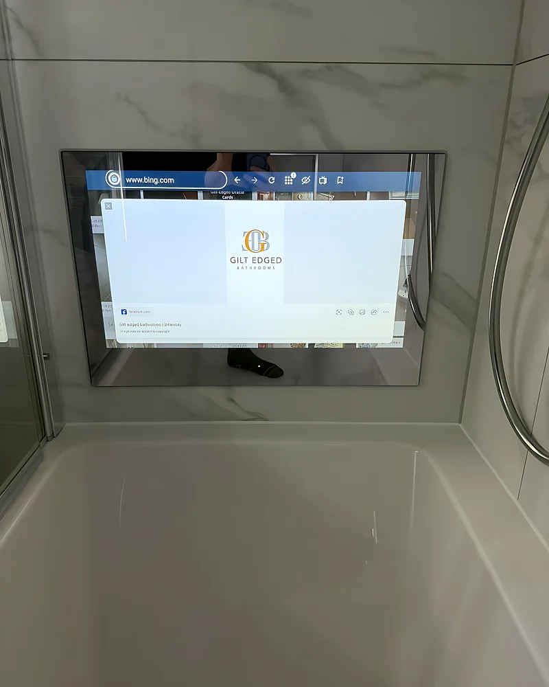 Smart TV set into the wall over the bath