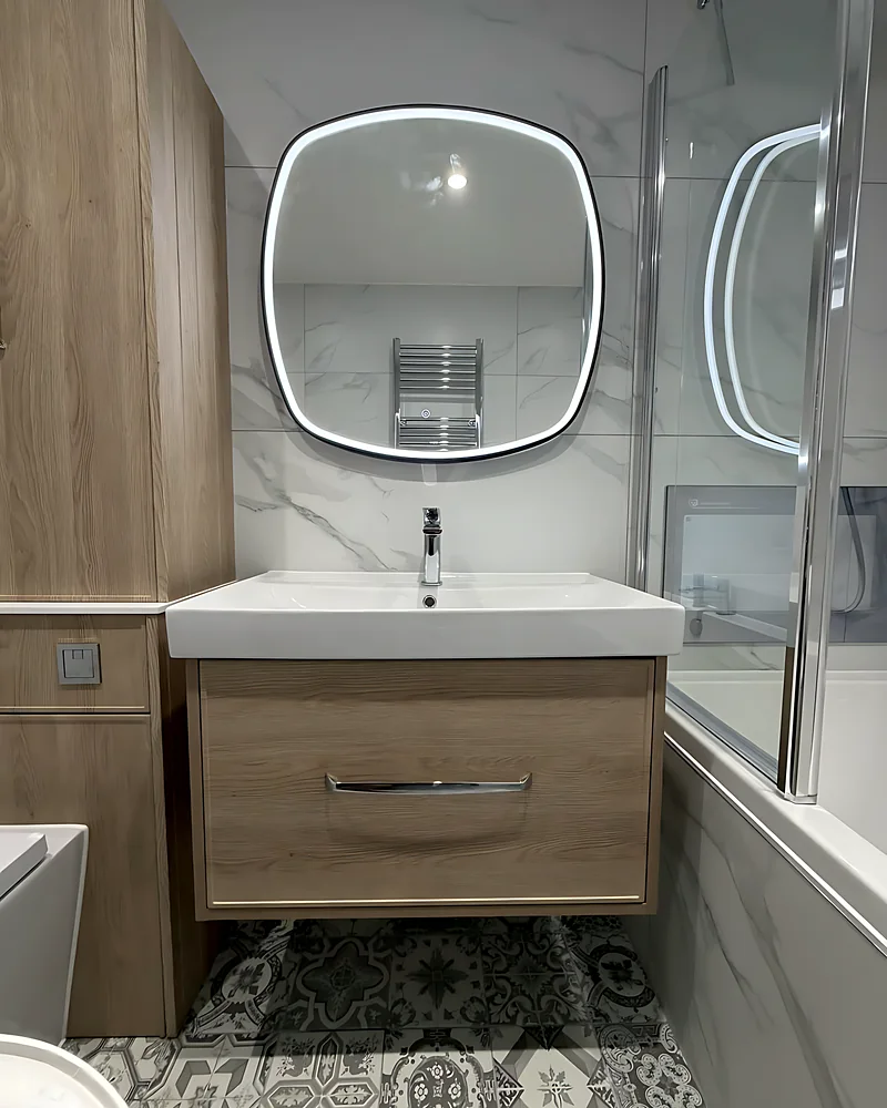Vanity under an LED mirror