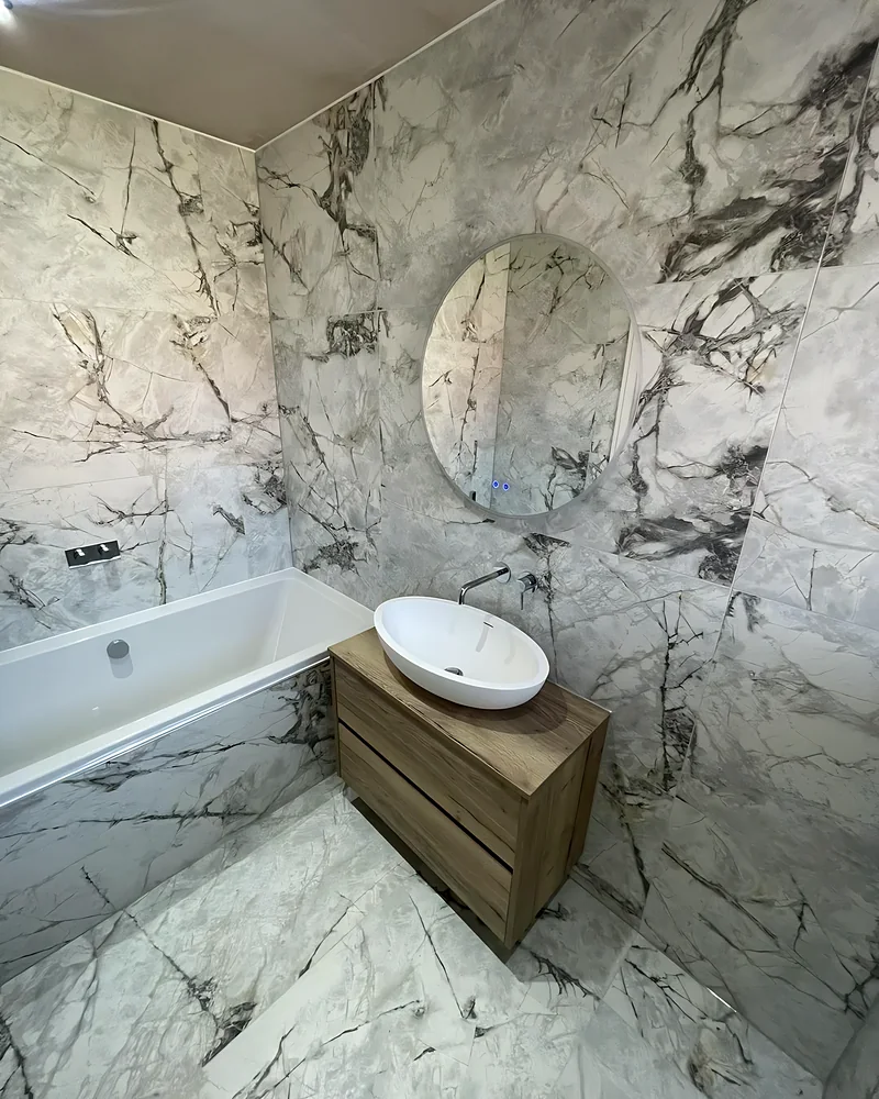 Wood vanity and round LED mirror